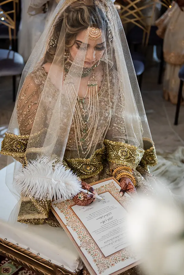 Beautiful Indian Bride Signing Marriage Certificate