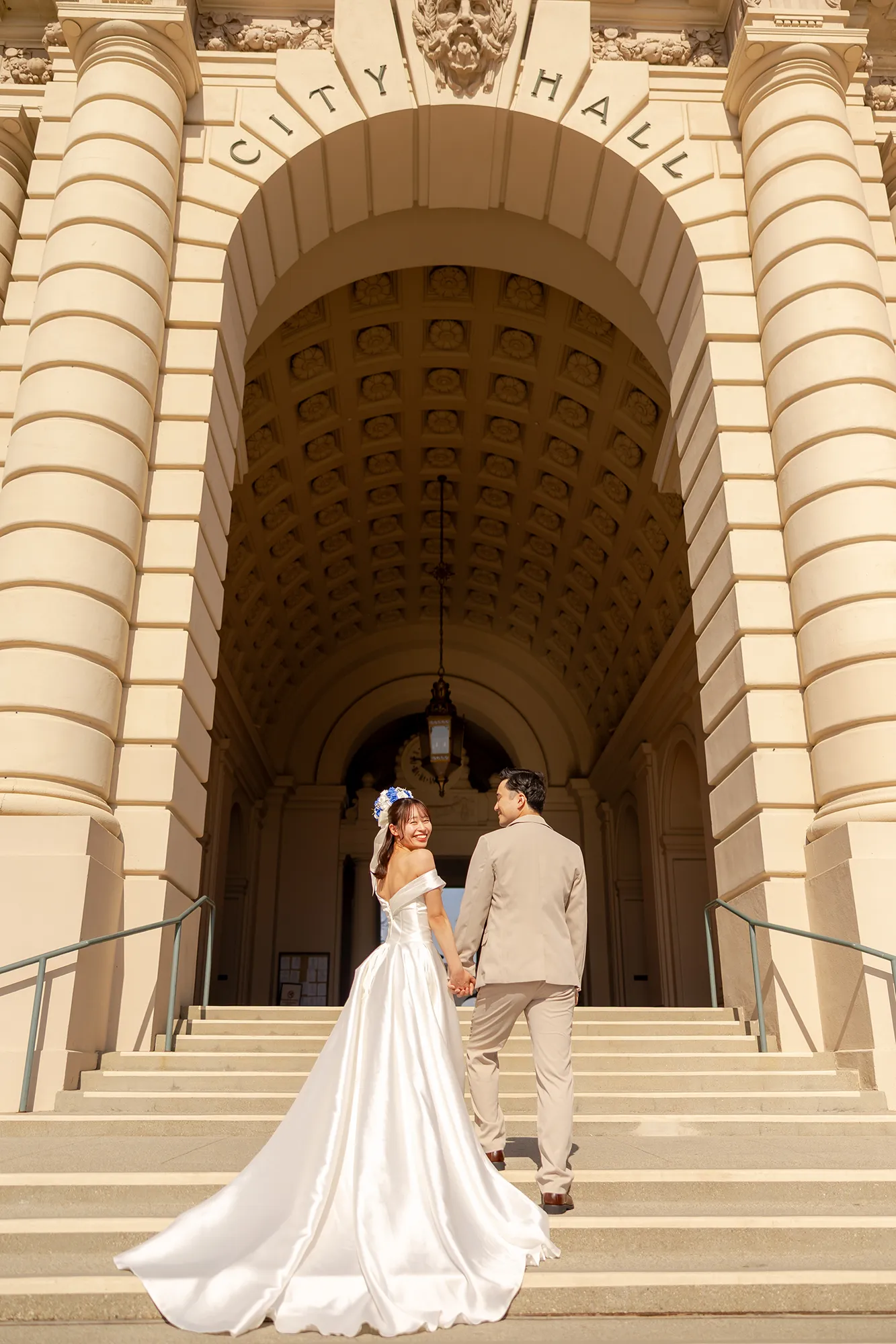 Pasadena City Hall engagement photo session asian couple walking toward the entrance